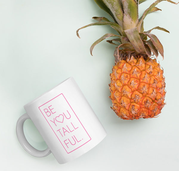 Tall women's coffee mug with the words "Be You Tall Ful"