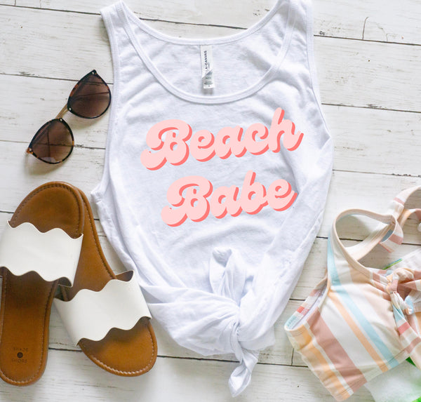 Tall women's long torso tank top with a Beach Babe retro font design.