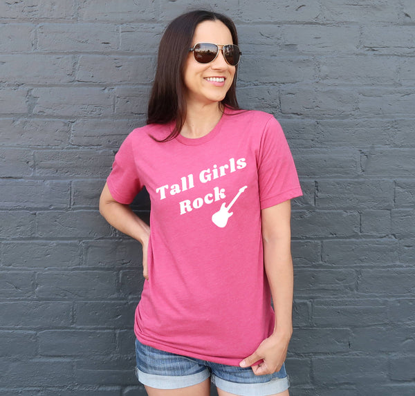 Tall woman wearing a "Tall Girls Rock" t-shirt with guitar design.