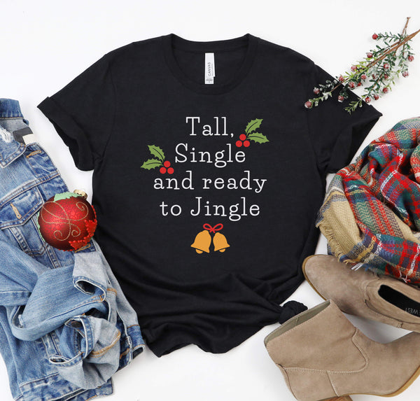 Funny Christmas tee that says "Tall, Single and Ready to Jingle".