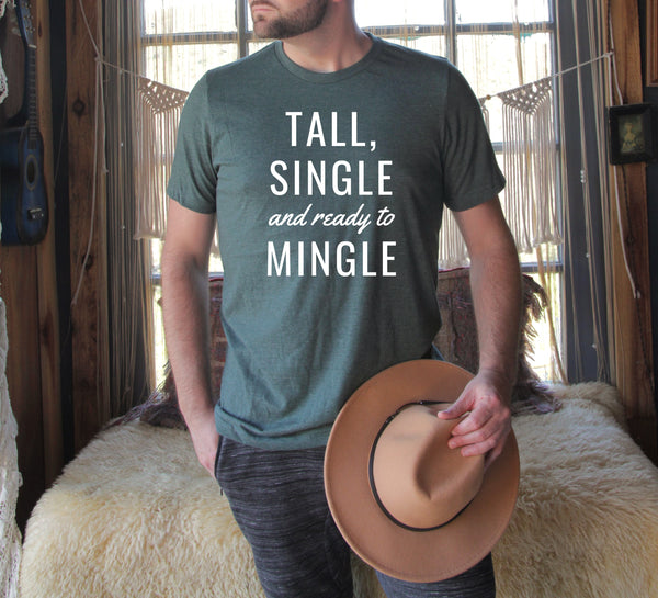Man wearing a "Tall, Single and Ready to Mingle" t-shirt.