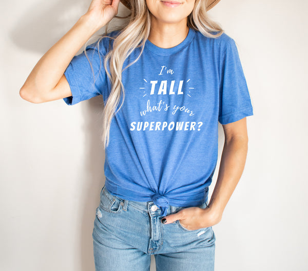 Woman wearing an "I'm Tall What's Your Superpower?" t-shirt from Tall Reali-tees.