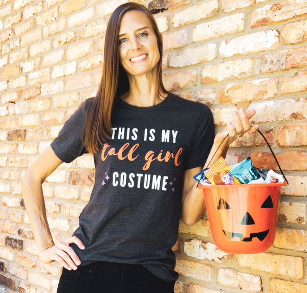 Tall woman wearing our "This Is My Tall Girl Costume" funny Halloween t-shirt.
