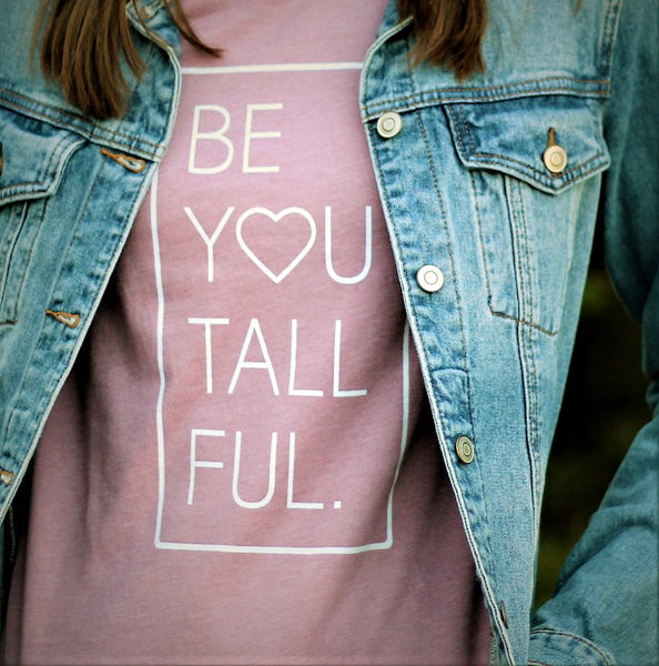 Women's graphic t-shirt with the words "Be-You-Tall-Ful"