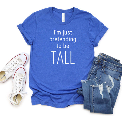 Funny t-shirt for tall men and women with a design that says "I'm Just Pretending To Be Tall".