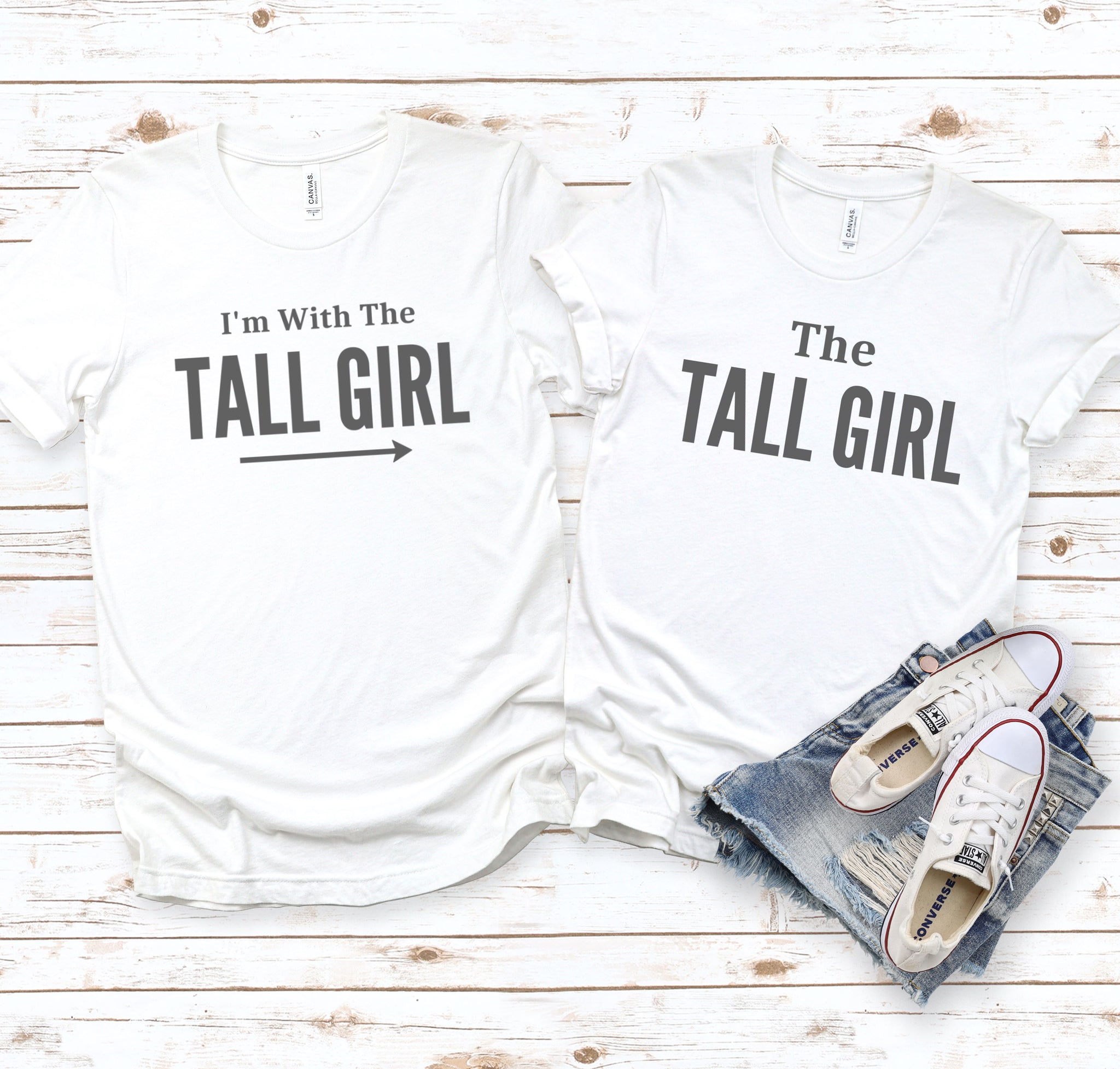 Tall girl couples matching t-shirts.