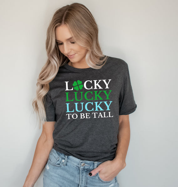 Female model wearing a Lucky To Be Tall St. Patrick's Day t-shirt from Tall Reali-tees.
