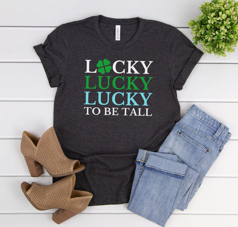 Lucky To Be Tall women's St. Patrick's Day t-shirt with a four-leaf clover.