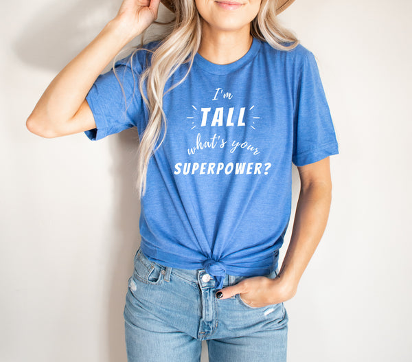 Woman wearing an "I'm Tall What's Your Superpower?" t-shirt from Tall Reali-tees.