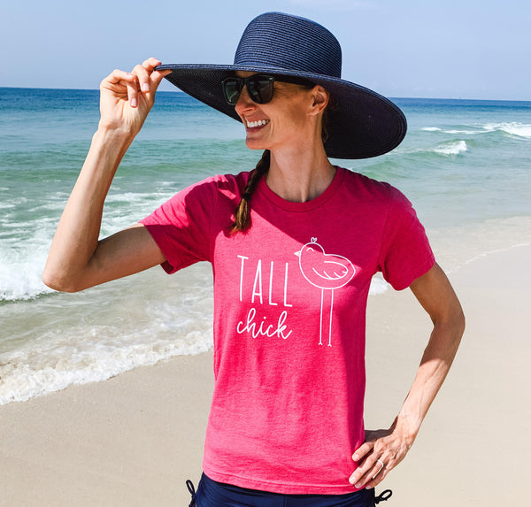 Female model wearing a "Tall Chick" ladies tee from Tall Reali-tees.